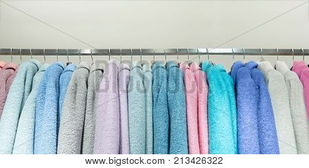 Colorful Bathrobes Hanging On Rack, Shopping