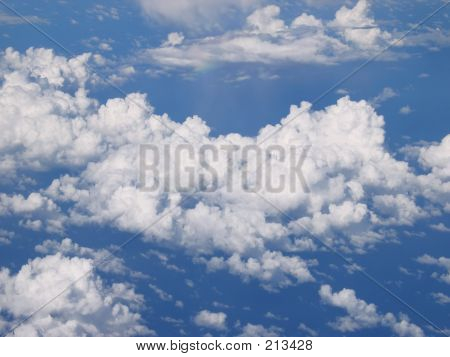 Over skyerne
