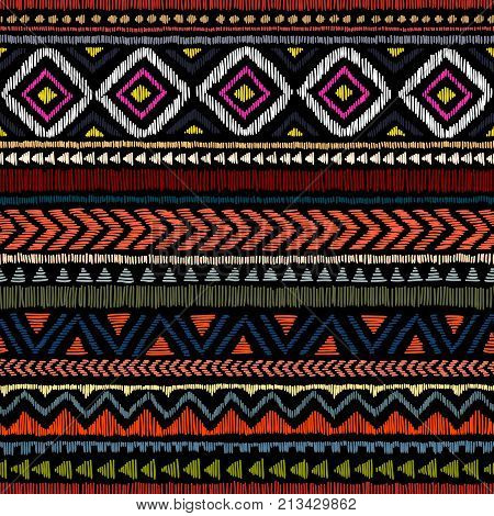 Embroidered ethnic seamless pattern. Aztec and tribal motifs. Striped ornament hand drawn. Print in the bohemian style. Vector illustration.