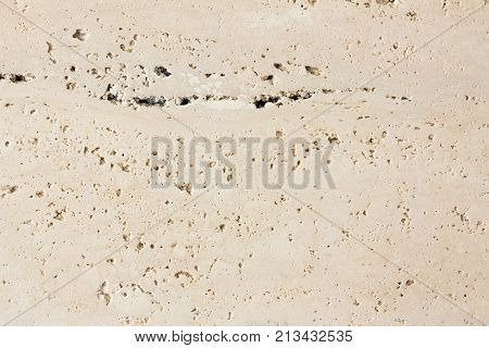 Travertine background. Porous texture of natural stone travertine.