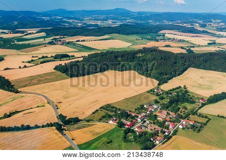 Summer aerial view of south Bohemia in the background of the Šumava. Czech Republic