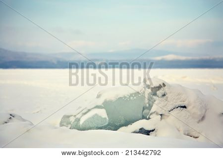 scenic winter landscape. view ice chunks with snow