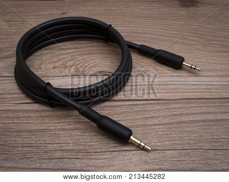 A 3.5mm audio interconnect cable nearly bundled together