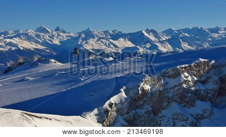 View from the Diablerets glacier Switzerland. Snow covered mountains in Valais Canton.
