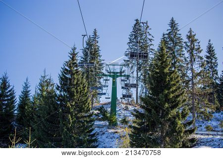 Mountain Cable Car, Ready For Winter Sports And Activities, In Beautiful Nature With Sunny Day Witho