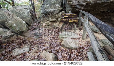 Recreational Hiking In Kentucky State Parks. Hiking trail and directional sign in the mountains of Natural Bridge State Park in Slade, Kentucky.