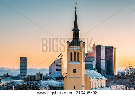 Tallinn, Estonia. Morning View Cityscape Of Church Of St. John Jaani Kirik Is Large Lutheran Parish Church In Tallinn Dedicated To St. John The Evangelist, Disciple Of Jesus Christ