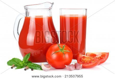 Tomato Juice In Glass Jug With Tomato, Garlic, Spices, And Basil Isolated On White Background