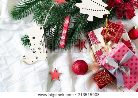 christmas background with gift boxes balls christmas ornaments and christmas tree branches copy space
