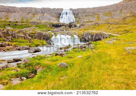 July 2013 Dynjandi This are the waterfalls of Dynjandi in the North of Iceland visited from many people in this period because representing an authentic wild scenery.