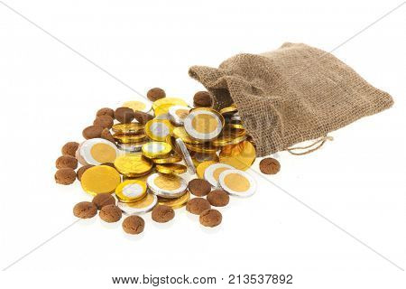 Bag with Dutch ginger nuts and chocolate coins for typical Sinterklaas holidays