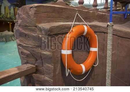 Lifebuoy beside the pool (safe, pool, swimming)