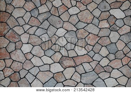 The Pattern Of Rustic Natural Stone Wall For Background Texture Copy Text