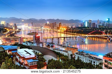 Aerial view of the mountain city of Chongqing the Yangtze River and the city night.