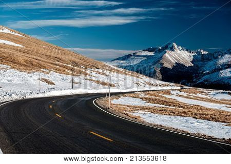 Trail Ridge Road, the highest (12,183 feet) continuous highway in the USA in high alpine tundra with rocks and mountains at autumn. Rocky Mountain National Park in Colorado, USA. 