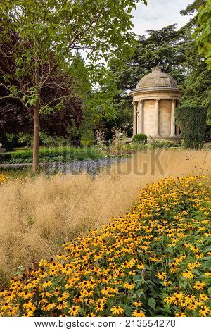 Jephson Memorial in autumn Day with lush planting flowers in Jephson Gardens, Royal Leamington Spa, Warwickshire, England, UK, September 2017
