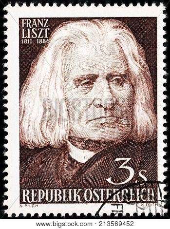 LUGA RUSSIA - AUGUST 20 2017: A stamp printed by AUSTRIA shows image portrait of famous Hungarian composer virtuoso pianist conductor and music teacher Franz Liszt circa 1961