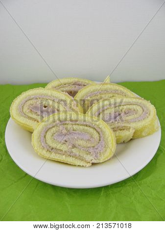 Pieces of glutenfree biscuit roll on a plate