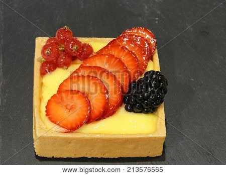 Pastry With Blackberry Strawberries In The Konditorei