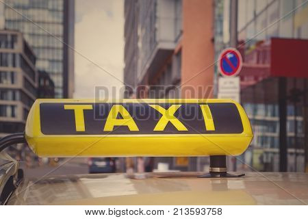 taxi in Dusseldorf City, Germany, sign closeup toned