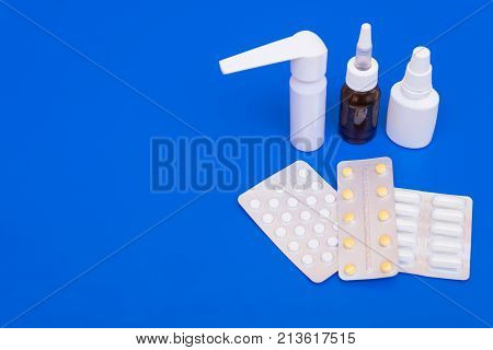 Medications, Pills And A Thermometer On A Bright Background
