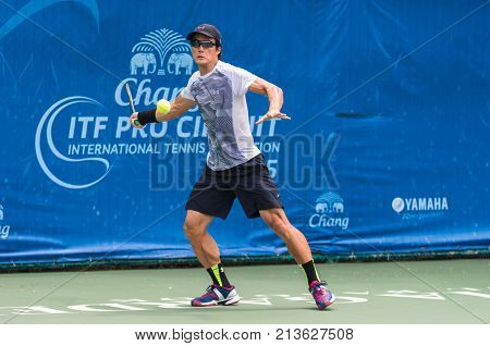 BANGKOK June 24 : Toshihide Matsui of Japan action in Chang ITF Pro Circuit International Tennis Federation 2015 at Rama Gardens Hotel on June 24 2015 in Bangkok Thailand.