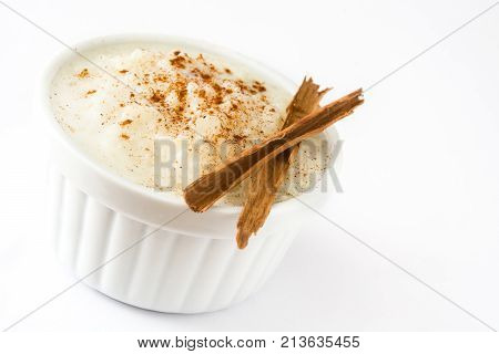 Arroz con leche. Rice pudding with cinnamon isolated on white background