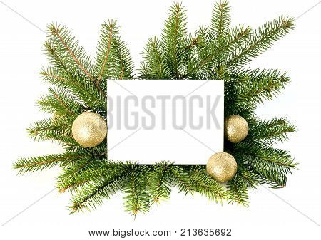 Christmas invitation card for holiday greeting decorated by fir brunches and ornaments. Blank have copy space for text