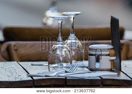 Empty Wine Glasses On The Table Served For Lunch, Dinner In Cafe, Restaurant Outside Or On Terrase