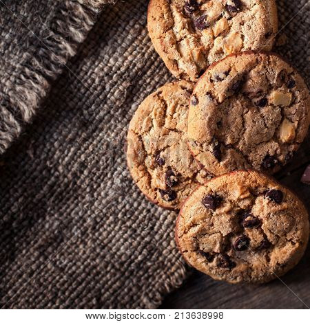 Homemade Chocolate chip cookies freshly baked on rustic wooden table. Selective Focus. Copy space.