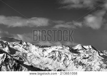 Black and white sunlight snow mountains at nice sun evening. Caucasus Mountains in winter. Georgia region Svaneti.