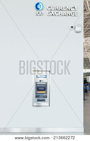 ZAGREB AIRPORT - 24 APRIL 2017: ATM machine and currency exchange with CCTV camera.