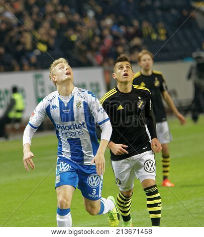 SOLNA SWEDEN - OCT 30 2017: Soccer player in the game AIK and IFK Gothenburg waiting to nick the ball. October 30 2017SolnaSweden