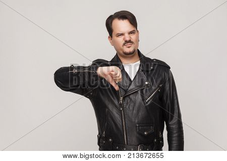 Dislike Sign. Unhappy Man Grimacing And Showing Disagree Sign.