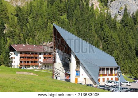 Italy Malga Ciapela - August 26 2016: the view of the cable car departure station in a sunny day on August 26 2016 in Malga Ciapela Veneto Italy.