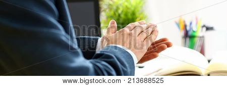 Man in suit clap his arms congrats for successful seminar in office closeup. Thank symbol great lecture job emotion worker introduce colleague negotiation happy birthday win career project idea