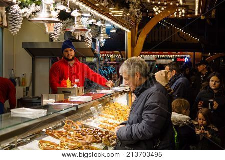 BERLIN - NOVEMBER 12 2017: Tradition Christmas Market (Weihnachtsmarkt) on Potsdamer Platz. Selling various snacks.