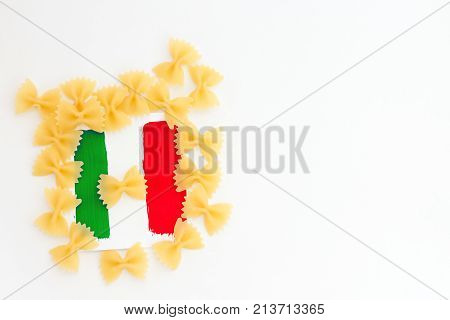 Miniature Paper Flag Italy With Pasta. Italian Flag Pointer On White Background. With Copy Space.