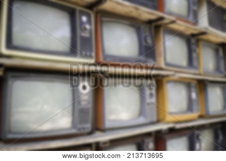 Stack of old TV vintage style background stock photo