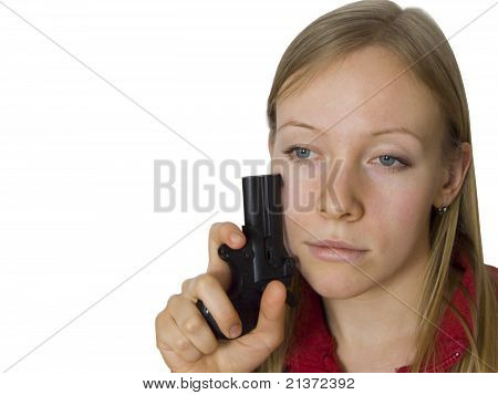 Dreamy young woman with gun