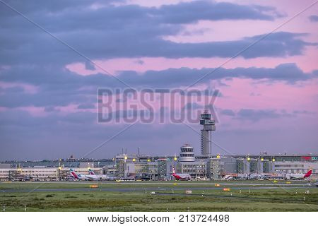 DUESSELDORF , GERMANY - OCTOBER 05 2017: The sun is producing amazing colours over Duesseldorf international airport