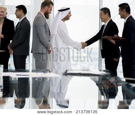 Business Partners Introductionary Handshake Bow