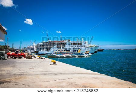 CEBU CITY, PHILIPPINES -MARCH 24, 2016: Passenger Ferries at the port of cebu seaport Cebu city on March 24, 2016, Philippines. The busy port of cebu has ferry routes to most Philippines islands