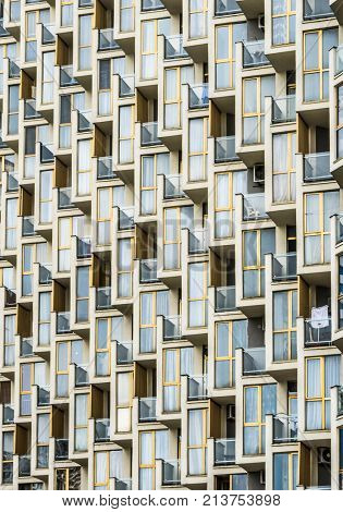 Facade of a big multistorey building with many windows
