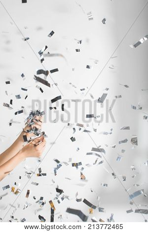 Woman Catching Falling Confetti