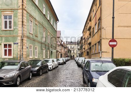 Sibiu Romania October 07 2017 : Timotei Popovich street in a rainy day in Sibiu city in Romania