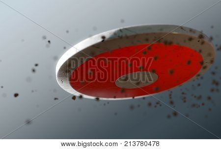 A dirty athletics discus caught in slow motion flying through the air scattering dirt particles in its wake - 3D render