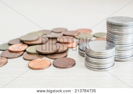 coins stacked same tower on desk in blank