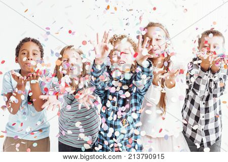 Kids Blowing Confetti