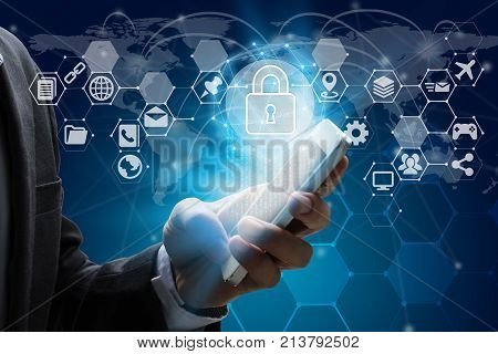 Businessman use smartphone with virtual screen padlock and Interface Icons over the Network connection of World map on technology background Cyber Security Data Protection Business Technology Privacy concept.